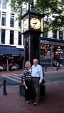 Alasaka Trip - Vancouver - Gastown Steam Clock - We returned to our hotel, rested a little, then went to the Vancouver Art Gallery. We went through two of the exhibits. "Grand Hotel: Redesigning Modern Life" which chronicled the growth of both large hotels and smaller motels. It included scale models of several of the hotels. " Persuasive Visions: 17th Century Dutch and Flemish Masterworks and Contemporary Reflections" was a collection of works on loan from the Rijksmuseum, Amsterdam contrasted with works in similar genres by contemporary artists. Dinner was at a little crepes restaurant which apparently had never heard of a "martini with a lemon twist". After several attempts Lucinda settled for one with a lemon wedge. After dinner we walked to Gastown - Vancouver's historic first down town. While not historic (having been built in 1977) a featured attraction of Gastown is the Steam Clock. It was built to camouflage a steam vent in the middle of the sidewalk. I was tired of carrying my big camera and I had left it in the hotel. As a result I only had my small water/shock proof pocket camera, and I had not noticed that it was set to video mode. This picture is a snapshot from the short video a fellow tourist took of us in front of the steam clock. Alasaka Trip - Vancouver - Gastown Steam Clock