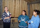 Alaska Trip - Anchorage - Alaska Native Heritage Center - Inupiaq St Lawrence Island Yupik Village - We continued our walk around Lake Tiulana, visiting both the Yup’ik/Cup’ik Village with its earth covered houses and an Iditarod Sled Dog Facility. Neither of these stops produced photographs that I included in this album. The next stop was at the Inupiaq/St. Lawrence Island Yupik Village. This was a large, earth covered structure. True to her teacher instincts Lucinda questioned the center staff about the inhabitant's living customs. Alaska Trip - Anchorage - Alaska Native Heritage Center - Inupiaq St Lawrence Island Yupik Village
