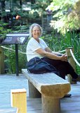 Alasaka Trip - North Vancouver - Capilano Suspension Bridge Park - While I was up walking in the trees, Lucinda preferred to keep her feet on terra firma. After wandering around she stopped to rest for a while. This is the bench I found her on after I came down. Alasaka Trip - North Vancouver - Capilano Suspension Bridge Park